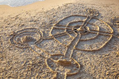 top view of a large sand castle on the beach