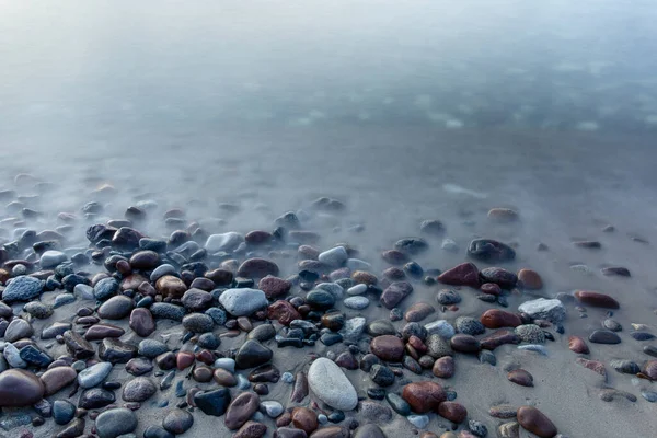 Multi Colored Smooth Stones Sea Long Exposure Twilight — Stock Photo, Image