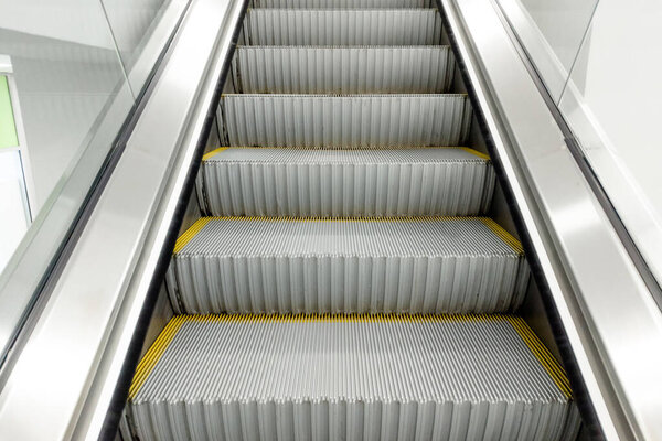 modern escalator steps without people