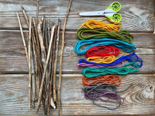 The set is ready for needlework with natural materials, dry sticks and yarn. — Stock Photo, Image