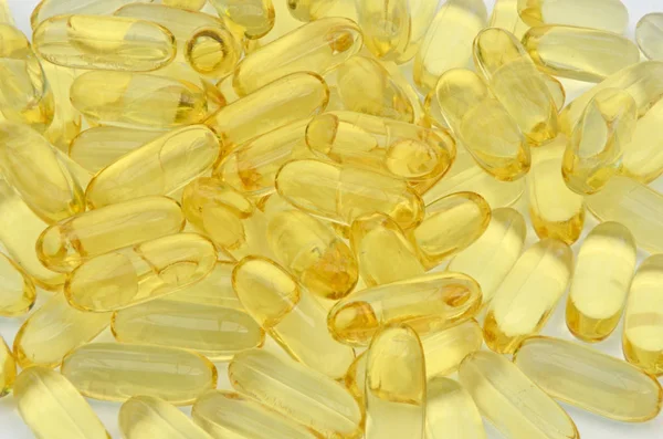 Yellow Fish Oil Gel Capsules Background