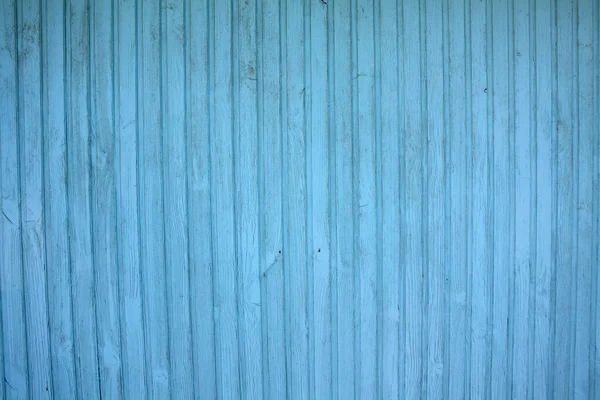 blue wooden house wall with vertical gloss