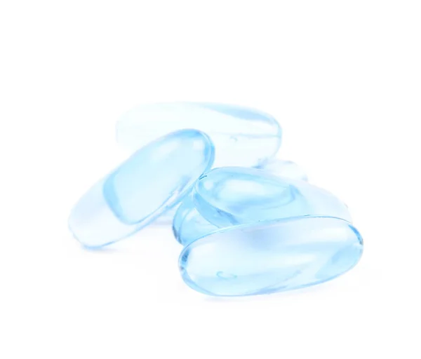 Högen av blå softgel piller isolerade — Stockfoto