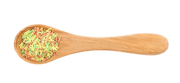 Spoon full of candy sprinkles isolated — Stock Photo, Image