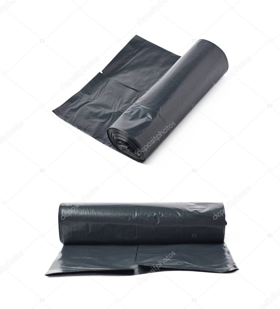 Black trash bag roll isolated