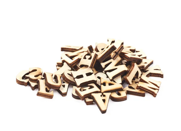 Högen av trä snidade bokstäver isolerade — Stockfoto