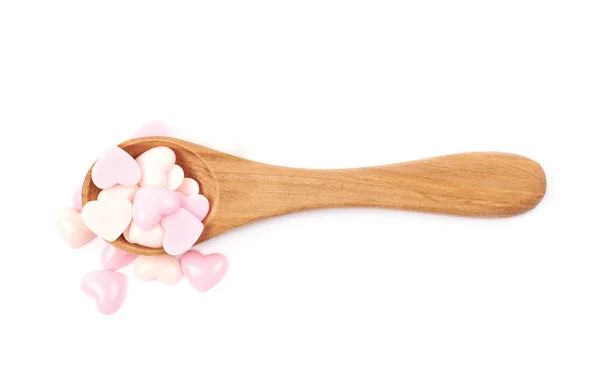 Spoon full of heart beads isolated — Stock Photo, Image