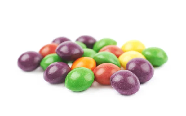 Renkli çiğneme paketlenmiş şekerlemeler yığını — Stok fotoğraf