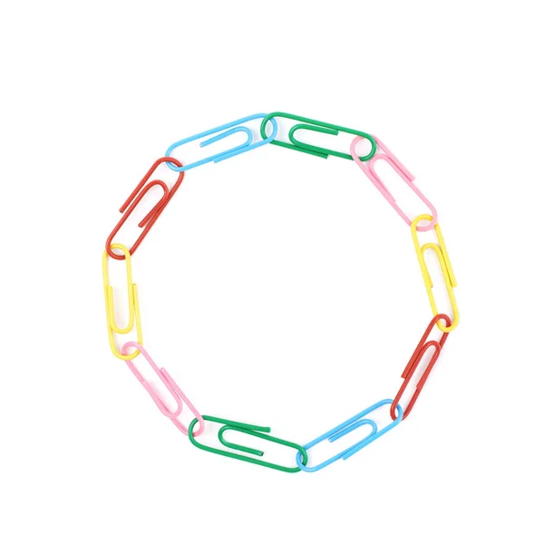 Round frame made of office clips — Stock Photo, Image