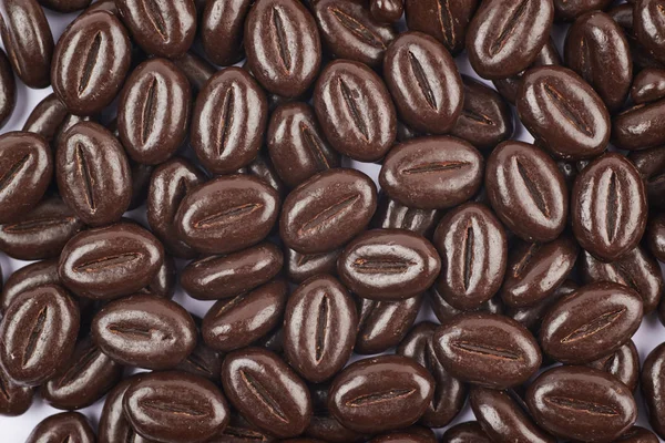 Surface coated with chocolate candies — Stock Photo, Image
