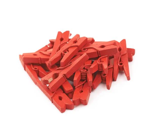 Pile of wooden clothespin isolated — Stock Photo, Image
