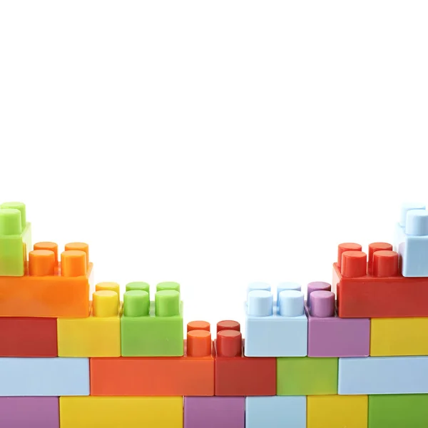 Wall made of toy bricks isolated — Stock Photo, Image