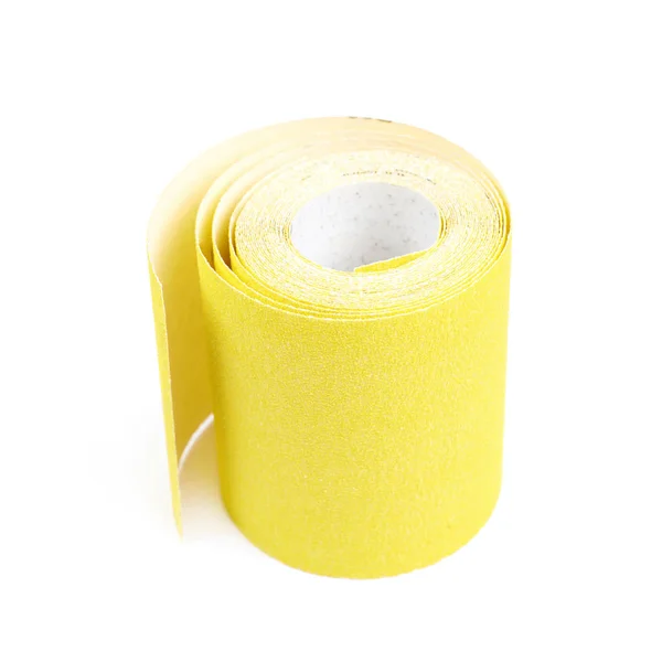 Рулон изолированной наждачной бумаги — стоковое фото
