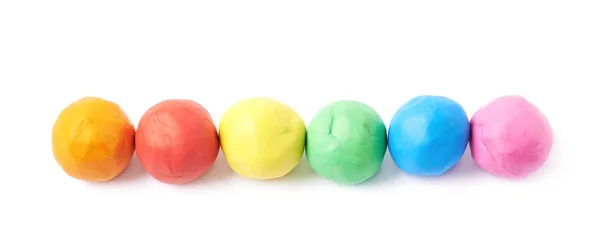 Lined up plasticine balls isolated — Stock Photo, Image