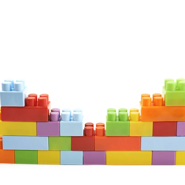 Wall made of toy bricks isolated — Stock Photo, Image