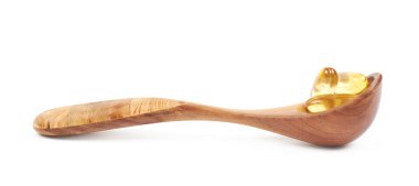 Tahta kaşık softgel hapları tam