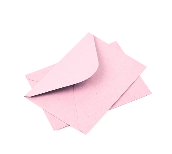 Różowy papier kopert na białym tle — Zdjęcie stockowe