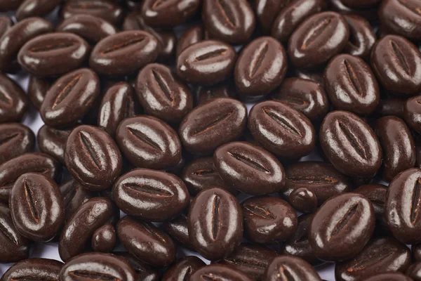 Superficie cubierta con caramelos de chocolate —  Fotos de Stock
