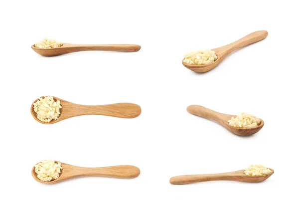 Spoon of minced garlic isolated — Stock Photo, Image