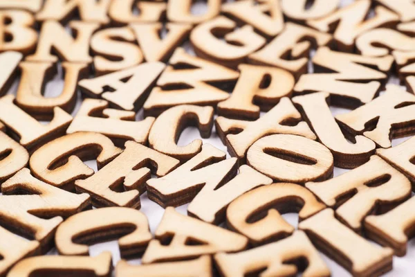 Surface covered with wooden letters