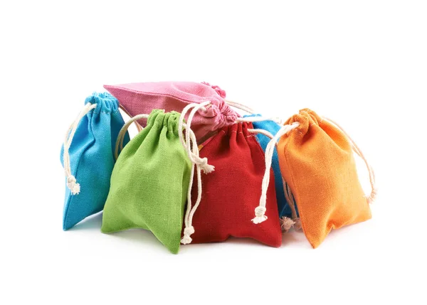 Pile of cloth gift bags isolated — Stock Photo, Image