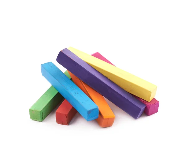 Pile of rainbow colored chalks isolated — Stock Photo, Image