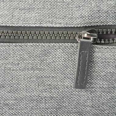 Bir fermuar ile gri kumaş