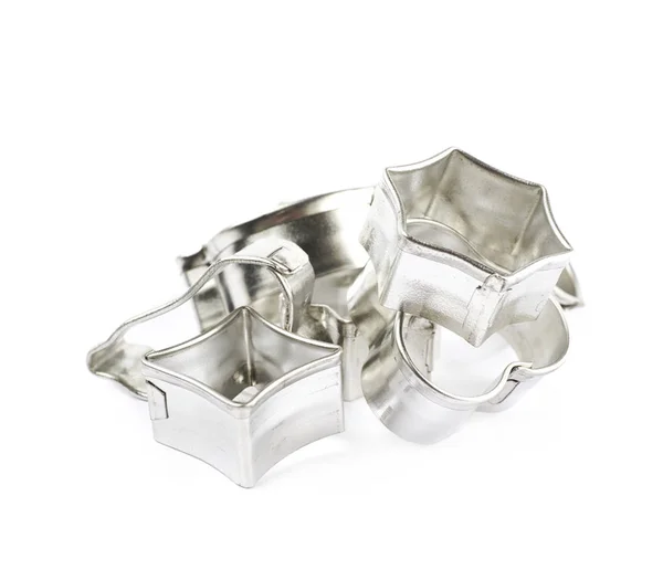 Stapel van metalen cookie cutters geïsoleerd — Stockfoto