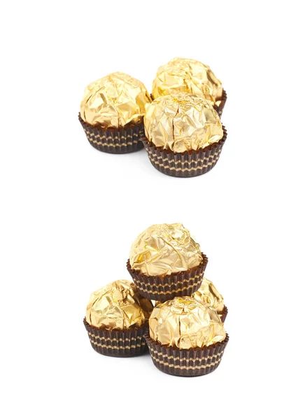 Haufen goldener Bonbons isoliert — Stockfoto