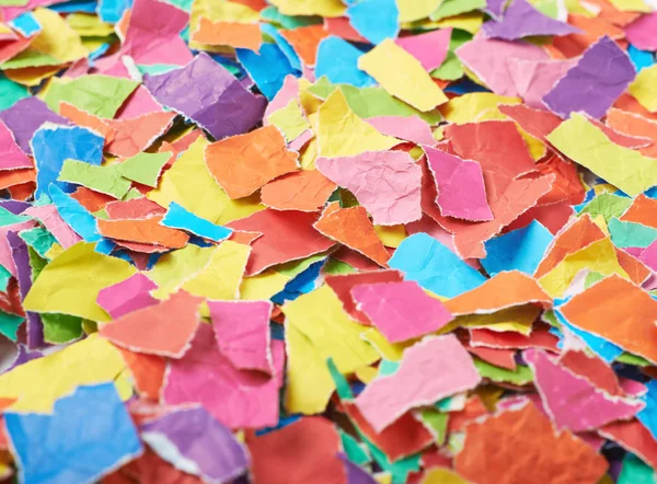 Surface covered with pieces of paper — Stock Photo, Image