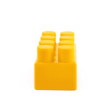 İzole tek oyuncak inşaat bloğu