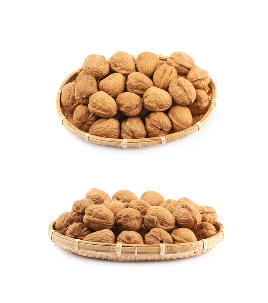 Wicker basket of walnuts isolated — Stock Photo, Image