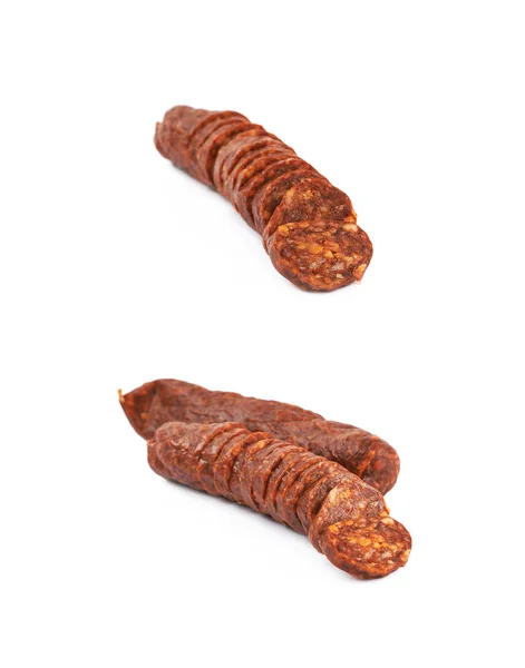 Bâton tranché de saucisse isolé — Photo