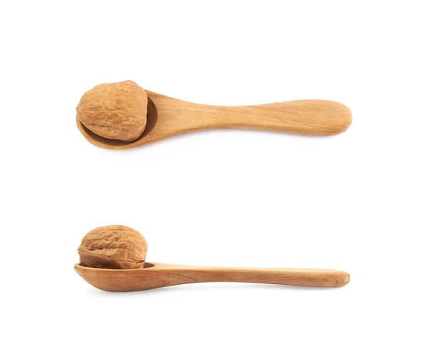 Walnut in a wooden spoon isolated — Stock Photo, Image