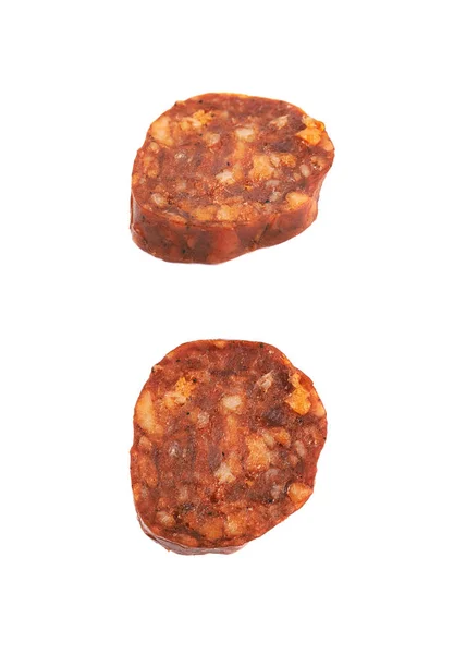 Single slice of a chili sausage isolated — Stock Photo, Image