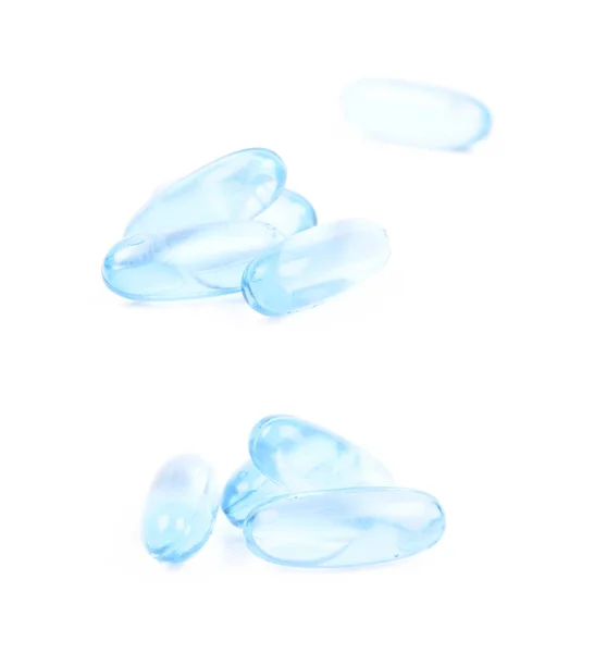 Pila de pastillas de gel blando azul aisladas — Foto de Stock