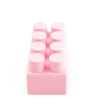 İzole tek oyuncak inşaat bloğu