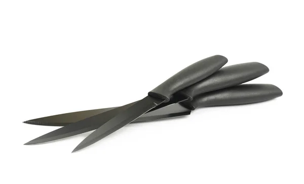 Black metal and plastic knives — Stock Photo, Image