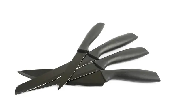 Черный металл и пластиковые ножи — стоковое фото