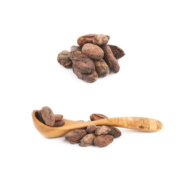 Wooden spoon of cocoa beans isolated — Stock Photo, Image