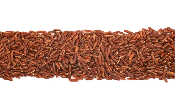 Line made of red rice isolated — Stock Photo, Image