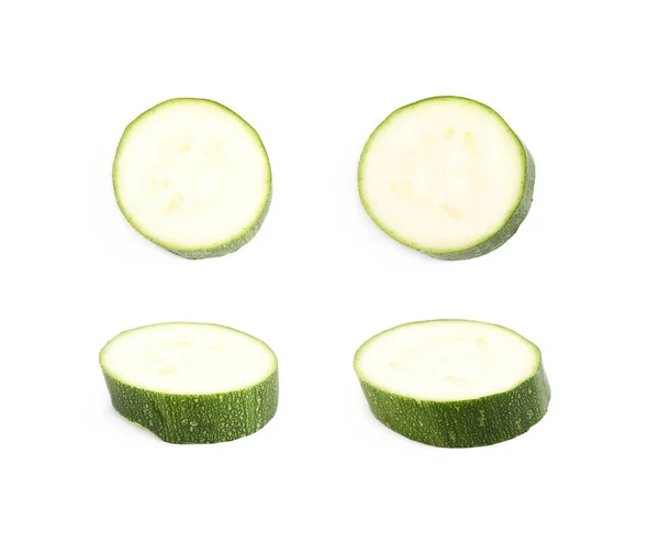 Grön zucchini skiva isolerade — Stockfoto