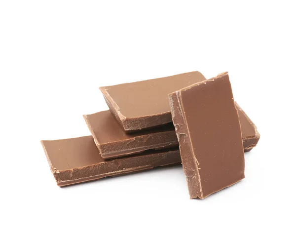 İzole sütlü çikolata parçaları yığını — Stok fotoğraf