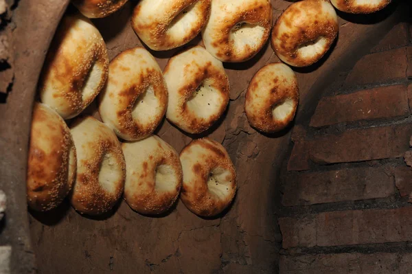 Process of cooking tandoor bread national Uzbek flatbread — Stock Photo, Image