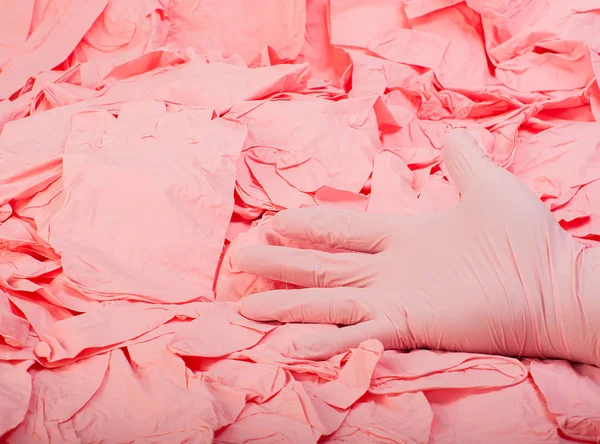 Çok Pembe eldivenleri arka plan üzerinde yeni pembe lateks medikal eldiven el