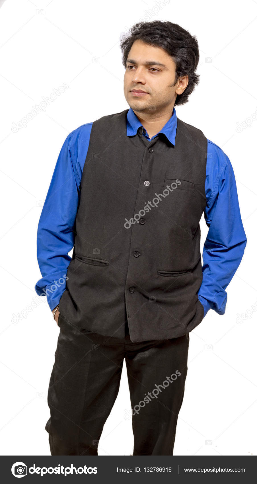 Young hispanic man wearing casual clothes looking to side, relax profile  pose with natural face with confident smile Stock Photo - Alamy
