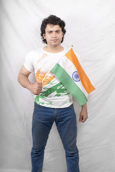 indian fitness male model posing with indian flag