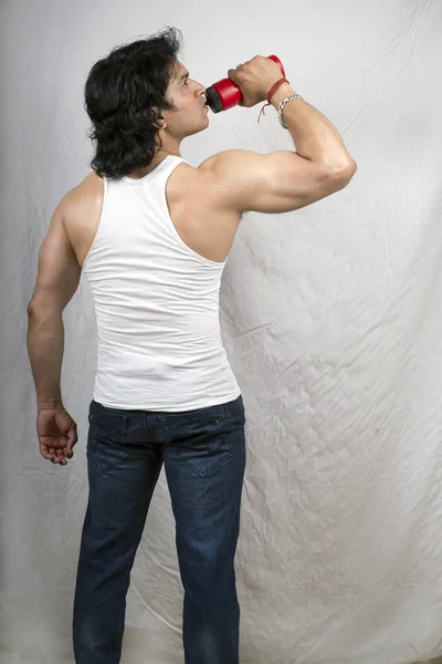 indian male model drinking protein
