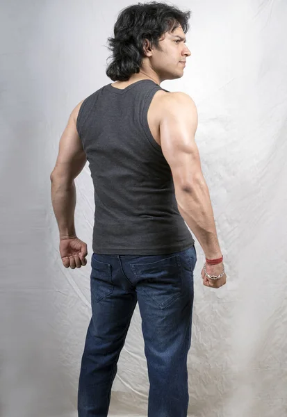 Young indian male model in grey vest — Stock Photo, Image