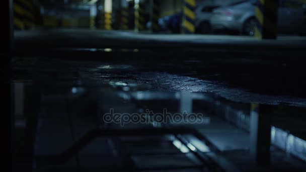 Dark parking garage. Has leaked water. — Stock Video